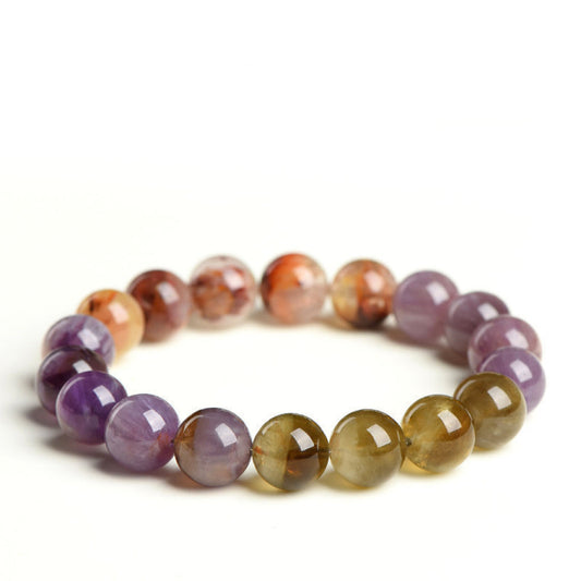 Auralite 23 crystal bracelet with golden, violet, and orange natural beads for healing