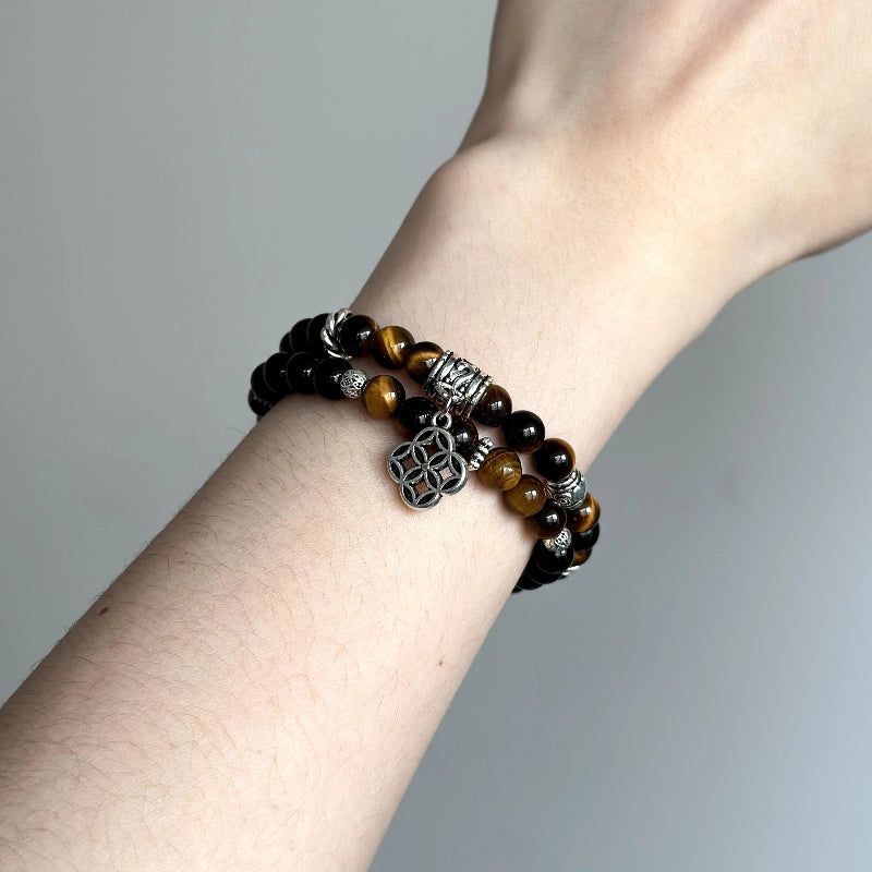 Energy crystal bracelet with Tiger’s Eye and Black Agate – supports grounding, willpower, and inner resilience.