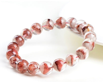 Bracelet with crystal beads – red phantom quartz for protection and spiritual growth
