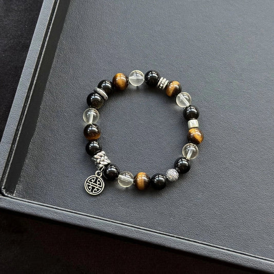 Healing crystal bracelet featuring Citrine, Tiger’s Eye, and Black Agate – supports abundance, confidence, and energetic protection.