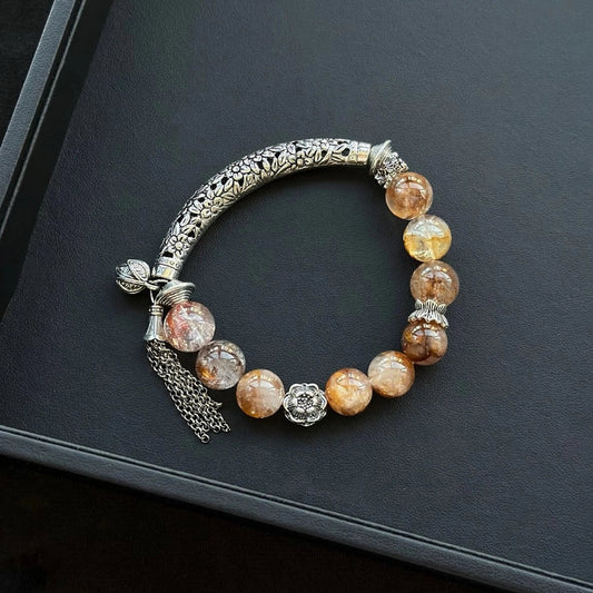 Healing crystal bracelet featuring Color Hematoid Quartz and Copper Rutilated Quartz – supports vitality, grounding, and emotional strength.