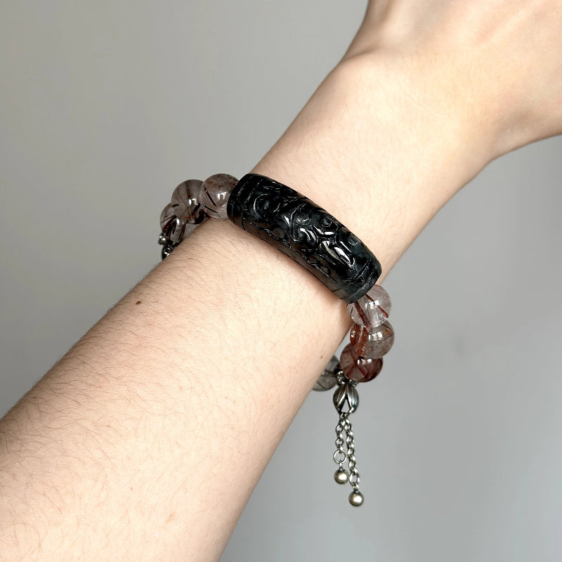 Energy crystal bracelet with Color Rutilated Quartz and Jade – designed for mental clarity, grounding, and heart chakra support.