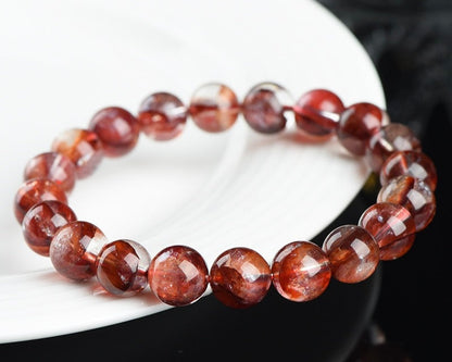 Crystal bracelet for focus and balance – dark red hematoid healing stone