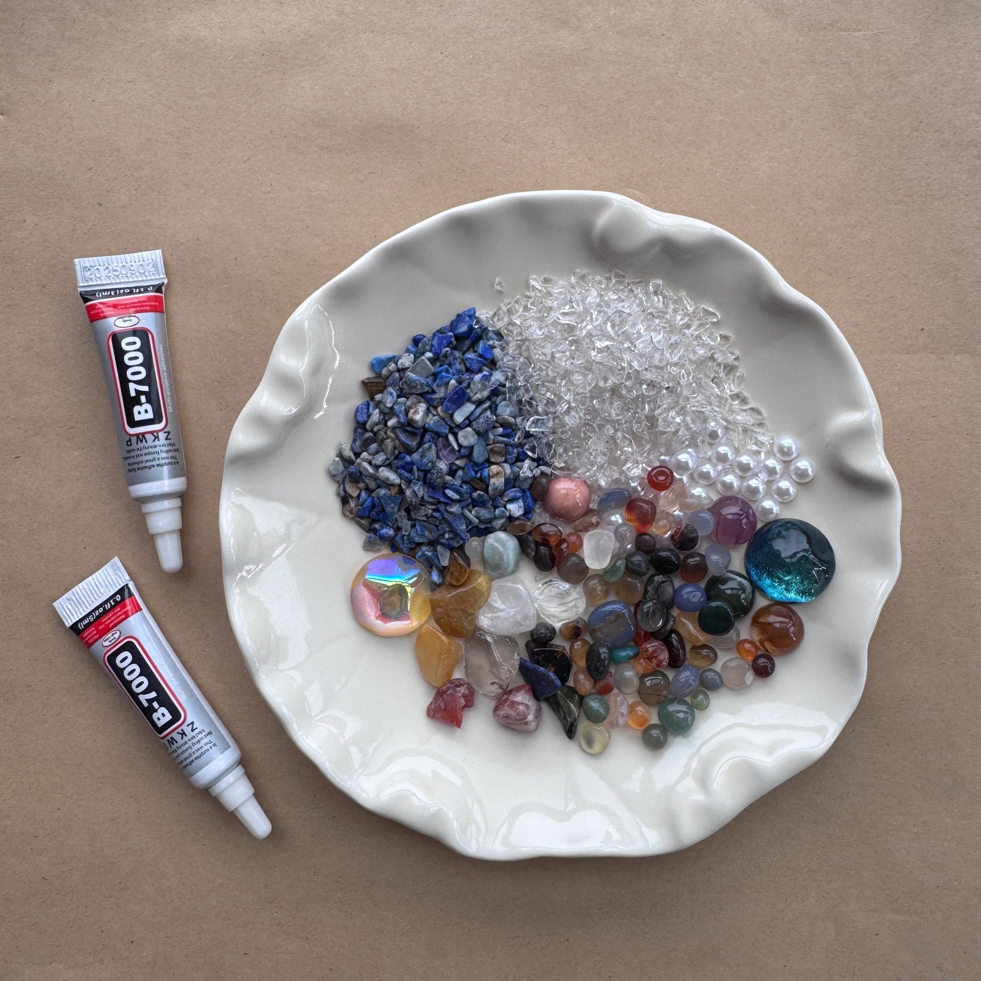 Close-up of a variety of natural healing stones and crystal chips ready for the galaxy DIY project.