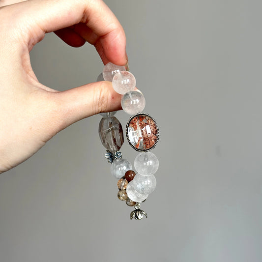 Beaded crystal bracelet made with Four Seasons Phantom and Pink Phantom – for energy cleansing, spiritual balance, and focus.
