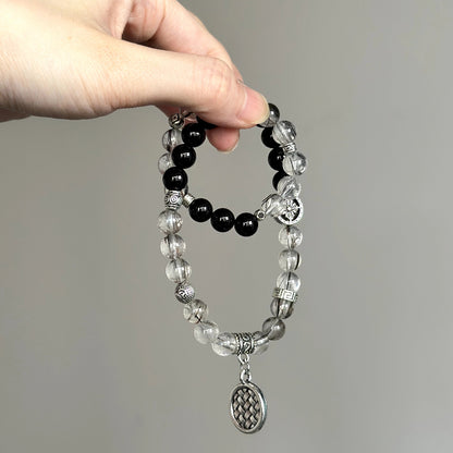 Crystal healing bracelet with Black Agate and Frost Rutilated Quartz – promotes stability, mental clarity, and energetic shielding.