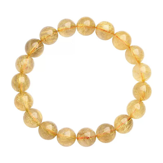 Golden rutilated quartz bracelet – healing crystal for energy, manifestation, and protection