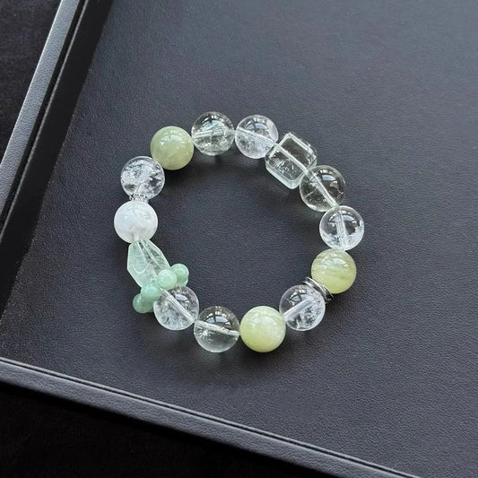 Healing crystal bracelet featuring Green & White Azeztulite, Hiddenite, and Snowflake Phantom Quartz – supports spiritual awakening, heart healing, and transformation.