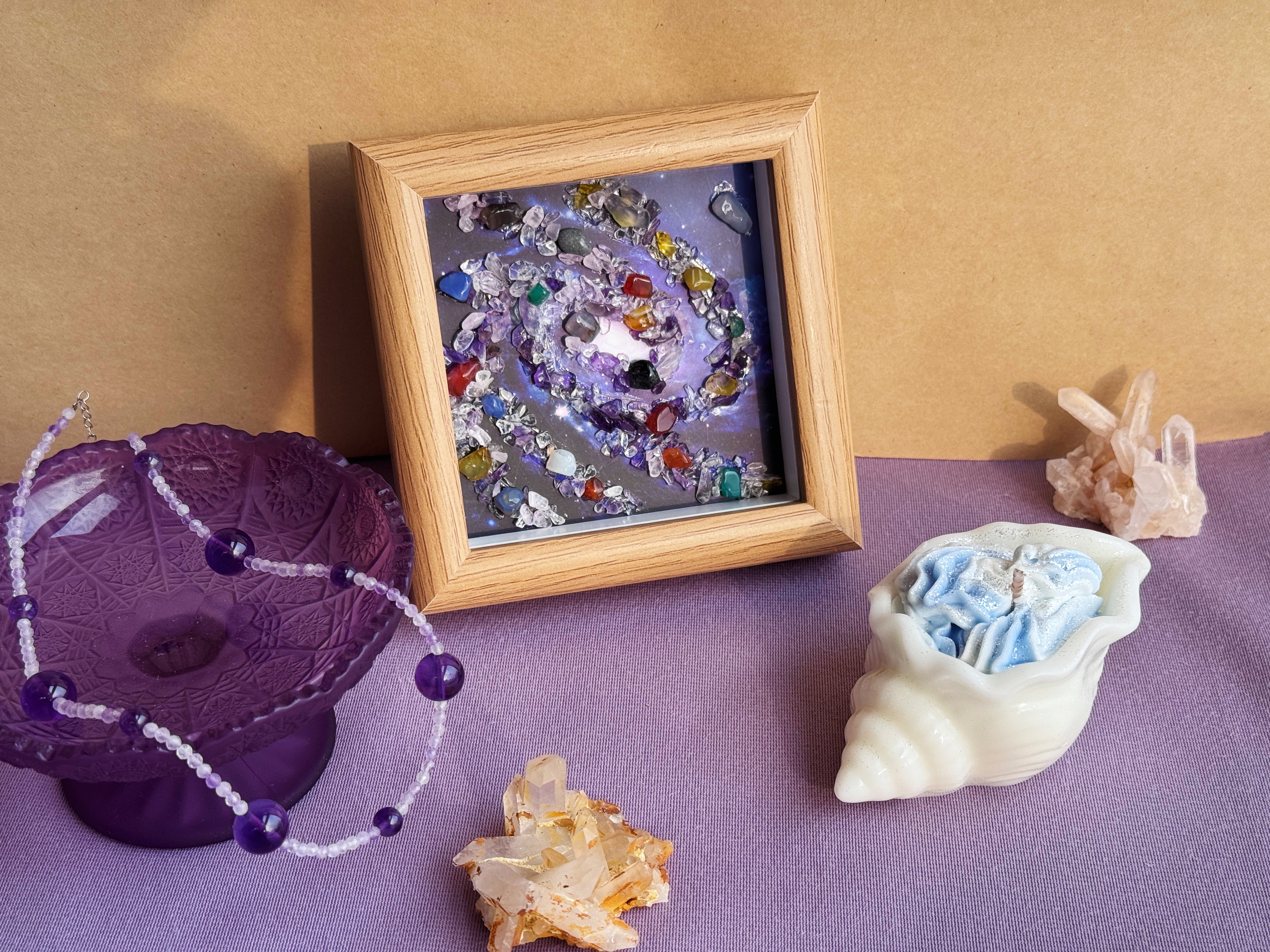Aesthetic small art and crystal wall art featuring a handmade gemstone tree of life and cosmic galaxy frame on display.