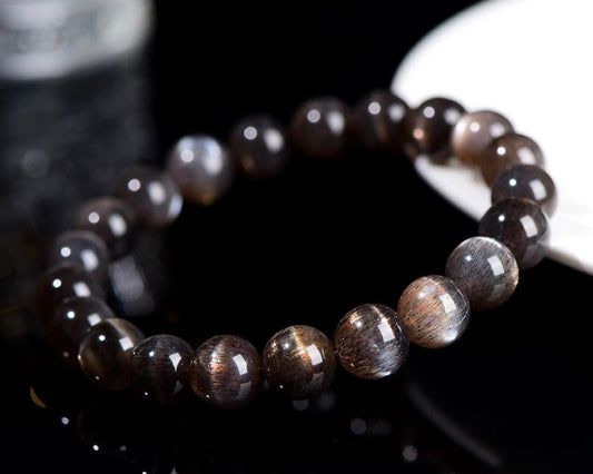 Healing crystal bracelet featuring Black Skeletal Sunstone for emotional strength and confidence