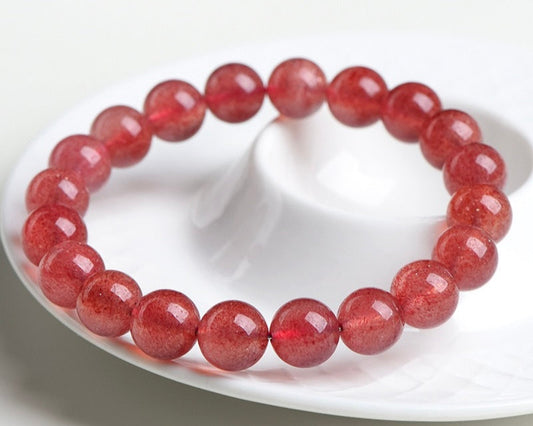 Healing crystal bracelet – strawberry quartz beads for joy, love, and compassion