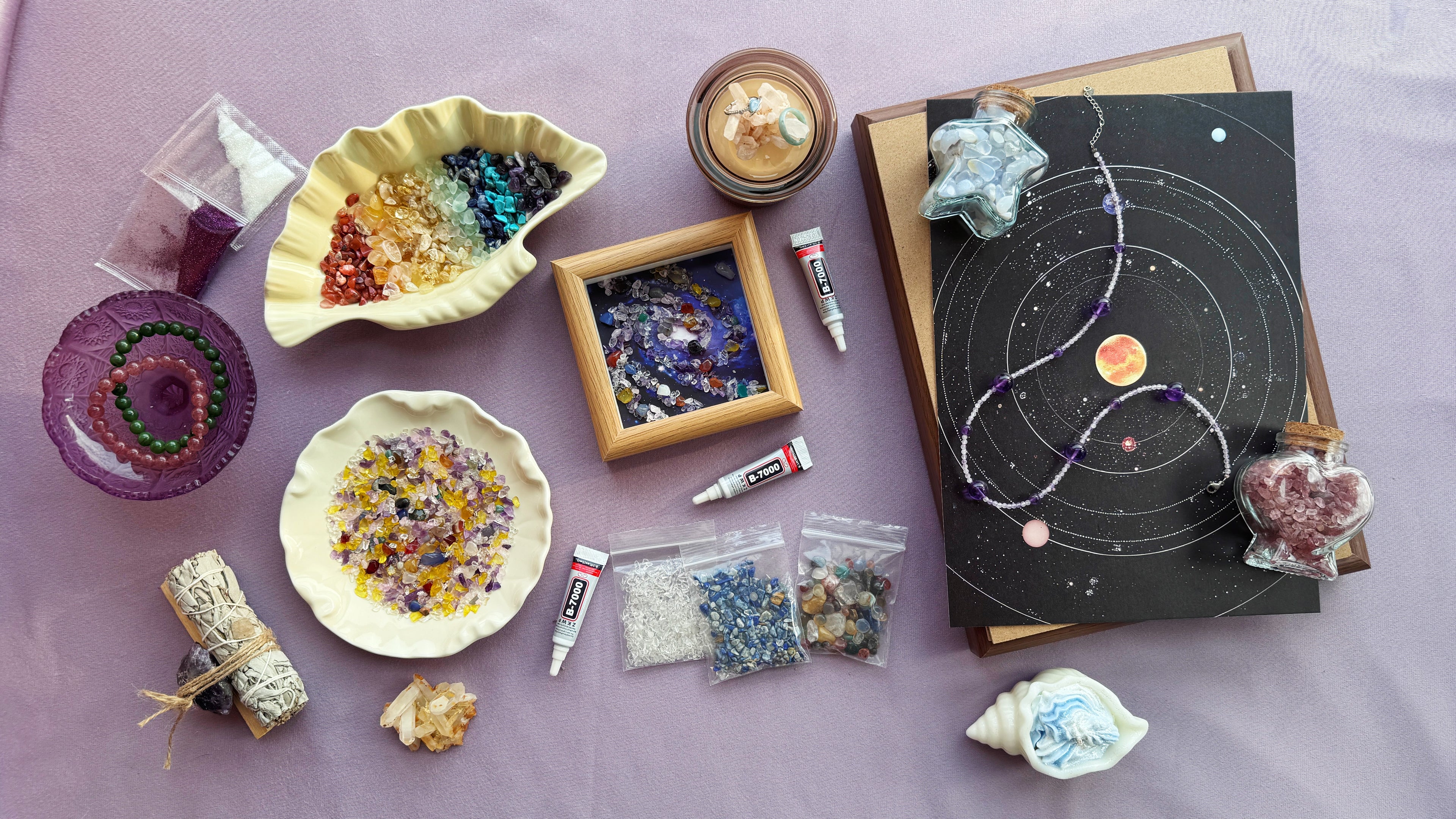 Finished Healing Crystal Spiral Painting Cosmic Art piece in a wood frame, featuring intricately hand-placed natural healing stones in a swirling galaxy pattern.