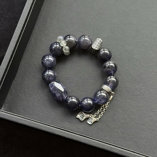 Healing crystal bracelet featuring Iolite and Grey Moonstone – supports intuition, emotional balance, and inner clarity.