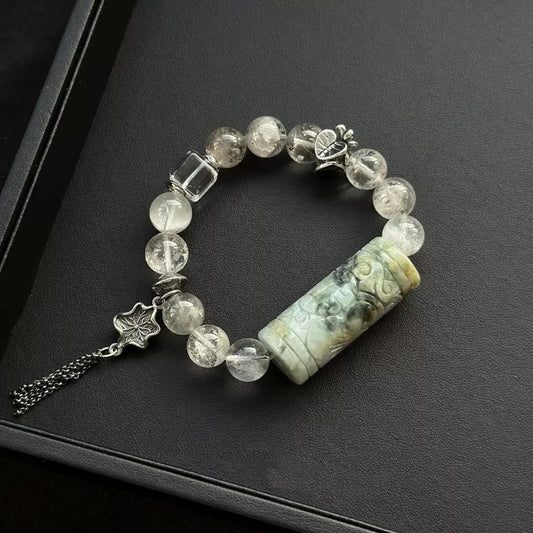 Healing crystal bracelet featuring Jade, Rabbit Hair Quartz, and Clear Quartz – supports emotional healing, grounding, and clarity.
