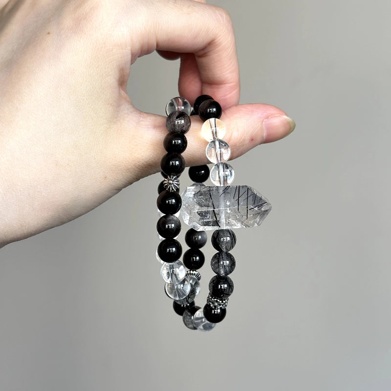 Beaded crystal bracelet with Black Rutilated Quartz and Obsidian – handcrafted jewelry for healing, grounding, and inner clarity.
