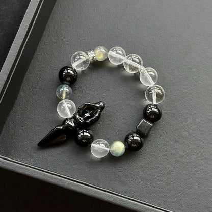 Healing crystal bracelet featuring Obsidian Vajra, Grey Moonstone, and Clear Quartz – ideal for protection, balance, and energy clarity.