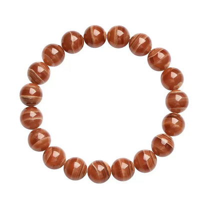 Old Mine Rhodochrosite crystal bracelet made of pinkish red healing stones