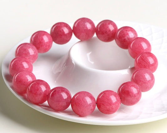 Pink crystal bracelet – rhodonite for forgiveness, self-love, and heart chakra healing