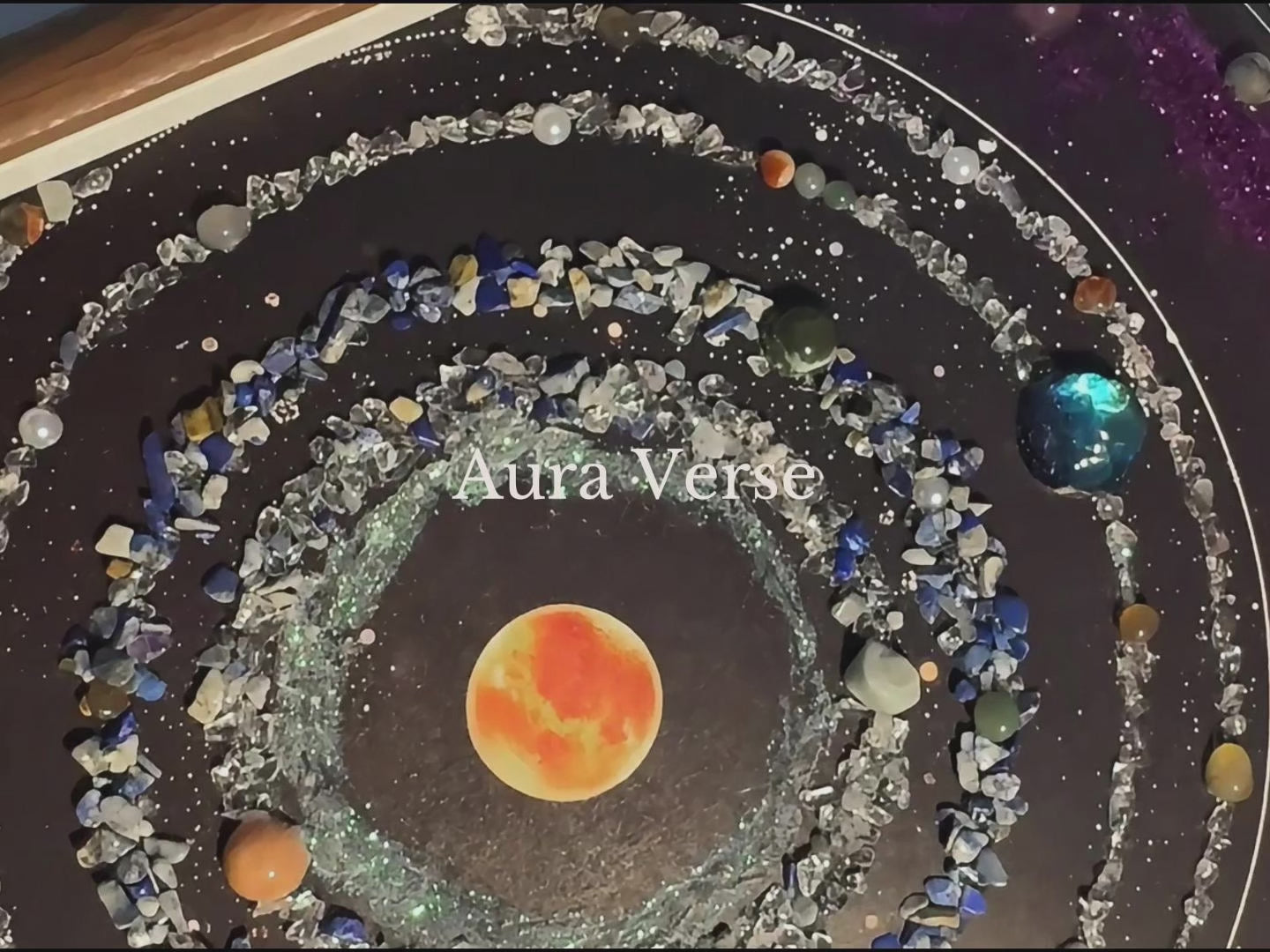 Load video: A 20-second time-lapse video demonstrating how to make a DIY galaxy crystal art painting, showing the step-by-step process of applying adhesive, spreading cosmic glitter, and hand-placing natural healing gemstone chips onto a square cosmic canvas.