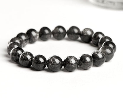 Protective black crystal bracelet for men and women with sunstone