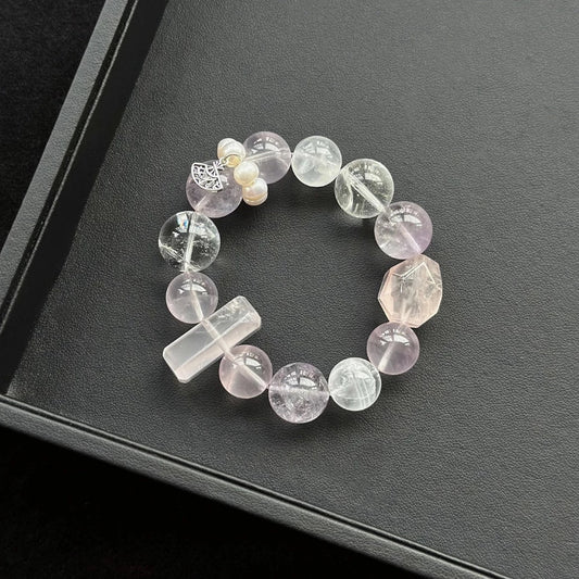 Healing crystal bracelet featuring Rose Quartz, Amethyst, White Azeztulite, and Rabbit Hair Quartz – supports love, spiritual clarity, and emotional balance.
