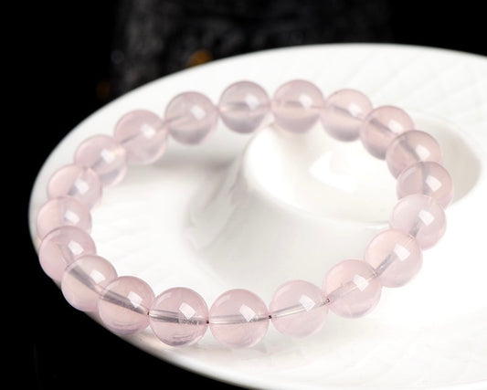 Handmade rose quartz bracelet from Aura Verse, perfect for daily wear and energy rituals.