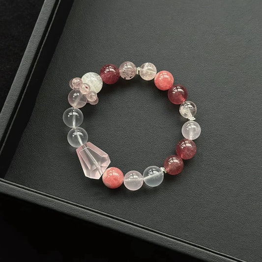 Healing crystal bracelet featuring Rose Quartz, Snowflake Phantom, Strawberry Quartz, and Rhodochrosite – supports love, emotional healing, and self-worth.