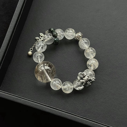 Sterling silver crystal bracelet, featuring Silver Rutilated Quartz, perfect for creativity and mental clarity.