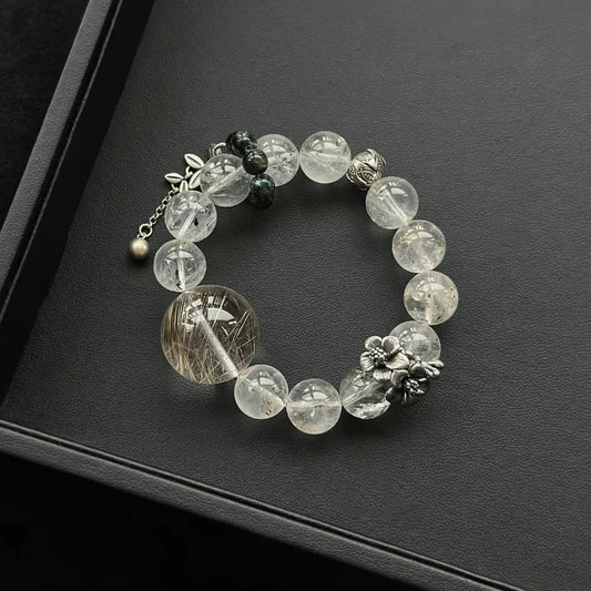 Sterling silver crystal bracelet, featuring Silver Rutilated Quartz, perfect for creativity and mental clarity.