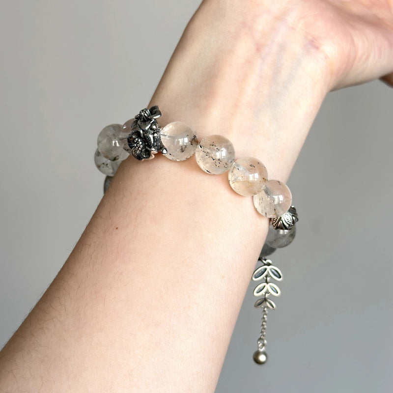 Unique handmade bracelet with Silver Rutilated Quartz – boosts creativity and spiritual awareness.