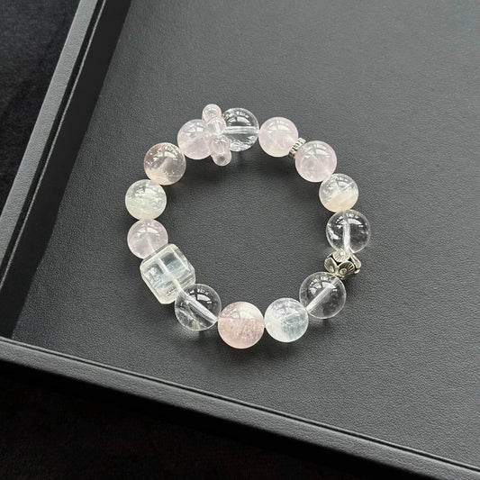 Healing crystal bracelet featuring Snowflake Phantom, Rose Quartz, and Clear Quartz – supports love, clarity, and emotional healing.