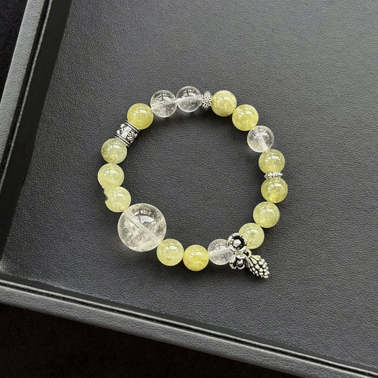 Healing crystal bracelet featuring White Phantom, Tsavorite, and Clear Quartz – supports clarity, abundance, and emotional renewal.