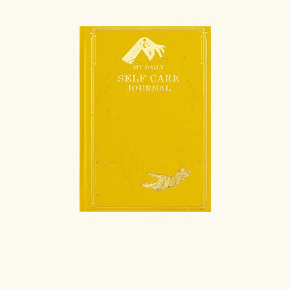 A vibrant yellow celestial journal with detailed gold embossed constellations and spiritual moon phase patterns.